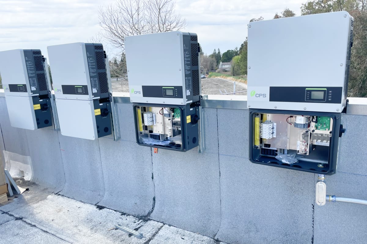 Solar inverters on a flat roof top